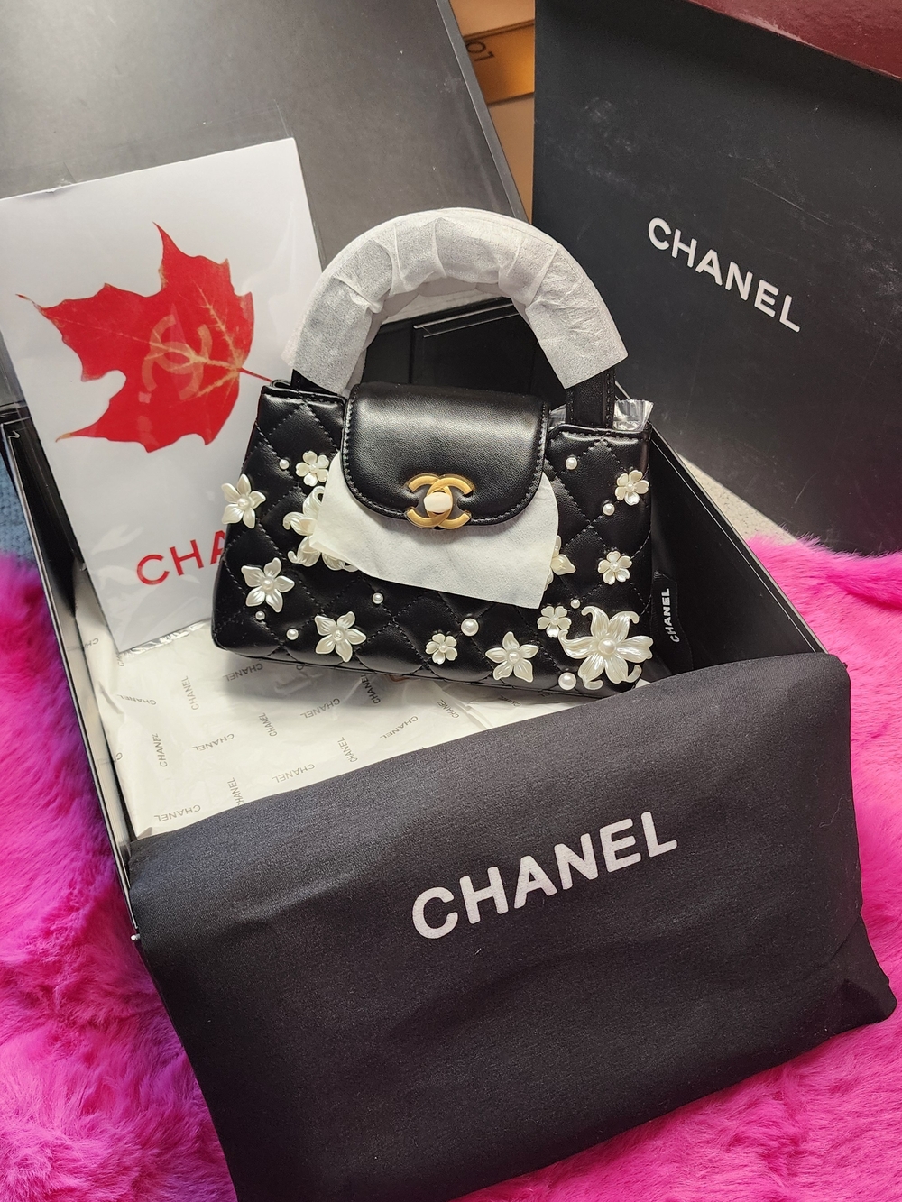 CHANEL Black Quilted Floral-Appliqué Top Handle Satchel